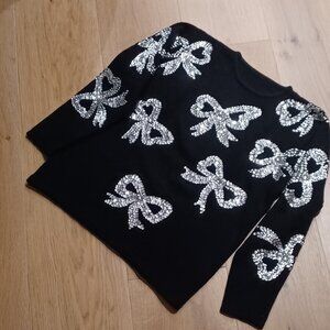 Vintage sweater with bows